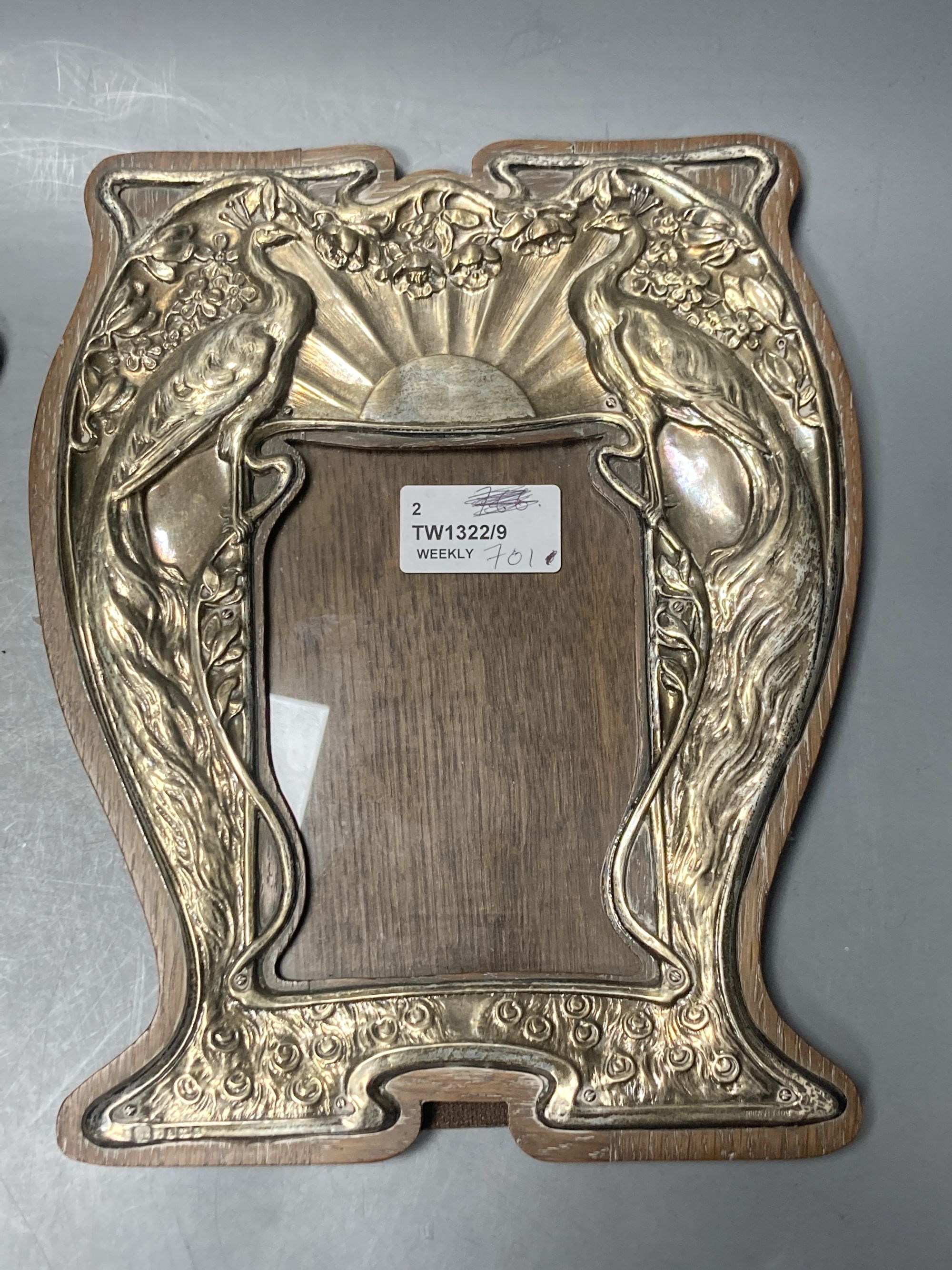 Two Art Nouveau silver-mounted wooden easel photograph frames by Hukin & Heath,